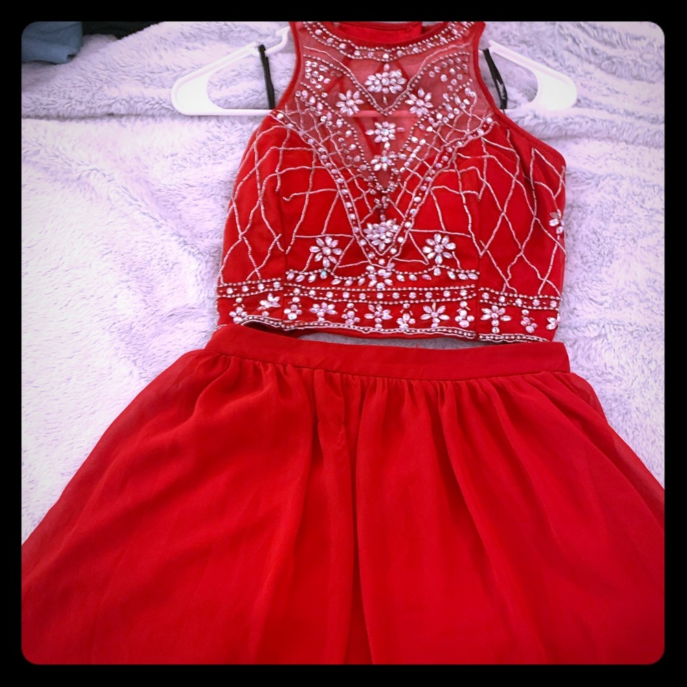 Short red two piece dress with beading